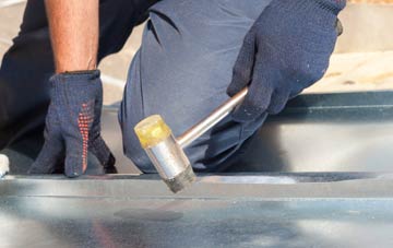 Locking metal flat roofing repairs